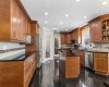 Kitchen with Black Galaxy Granite Flooring