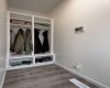 Rear mudroom off of the kitchen with man door out to the yard and garage