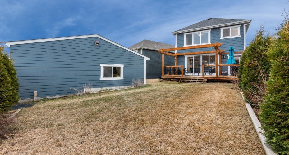 Huge yard with 24x24 garage, deck with pergola and RV parking