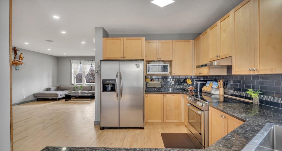 1200 Ravenswood Drive, Airdrie, Alberta T4A 0G7, 3 Bedrooms Bedrooms, ,3 BathroomsBathrooms,Residential,For Sale,Ravenswood,A2303089