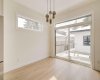 Dining Room with Direct Access to Backyard and Deck with Glass Railings