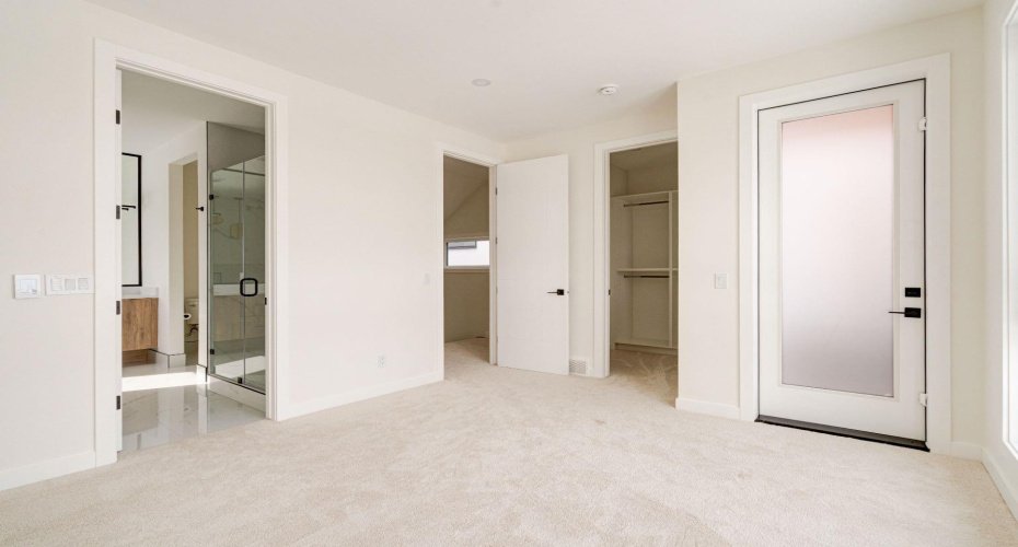 Primary Suite with Spacious Ensuite, Walk-in Closet and Balcony