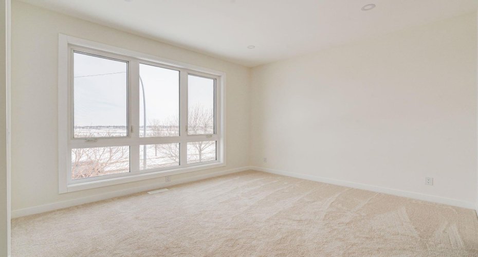 Fourth Bedroom with Oversized Window and Lots of Natural Light