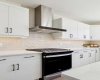 Your gas stove & wall mounted range hood - upgrades everywhere!