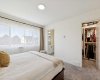 The main primary suite spans the entire width of the home and overlooks the backyard.  Don't be worried about the SW facing exposure, as home is equipped with A/C!!!
