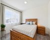 GENEROUS sized 2nd bedroom offering a ton of natural light.