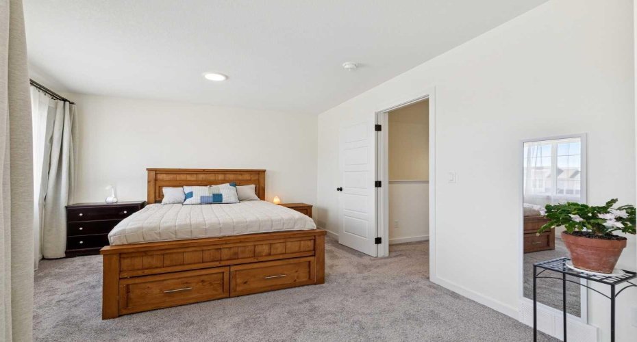 The 2nd bedroom spans the entire width of the upper level.