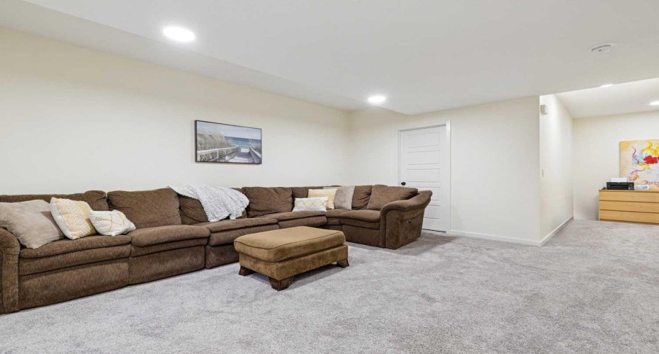Warm and neutral finishings throughout your lower level.