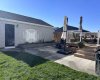 Large composite, glass and aluminum deck, large patio area, planters, and the perfect amount of green space complete with irrigation.