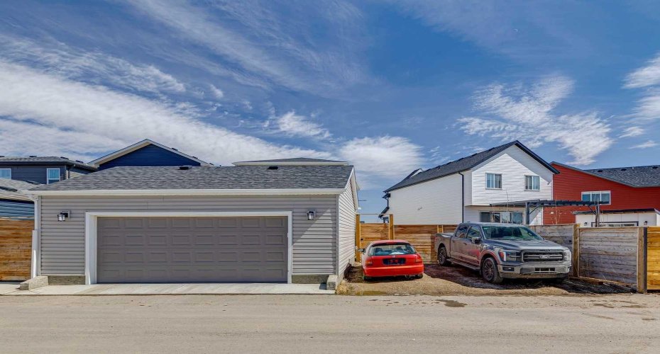 YOU WILL LOVE YOUR ACCESS TO 4-CAR PARKING!!  Plus, enjoy an oversized double detached garage and optimal sunshine in the private southwest-facing backyard. This move-in-ready home offers modern comfort, income potential FOR FUTURE, and long-term value in one of Calgary’s fastest-growing communities.
