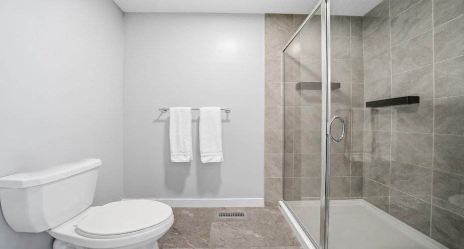 902 Bluerock Way, Calgary, Alberta T2Y 0S5, 3 Bedrooms Bedrooms, ,3 BathroomsBathrooms,Residential,For Sale,Bluerock,A2304430