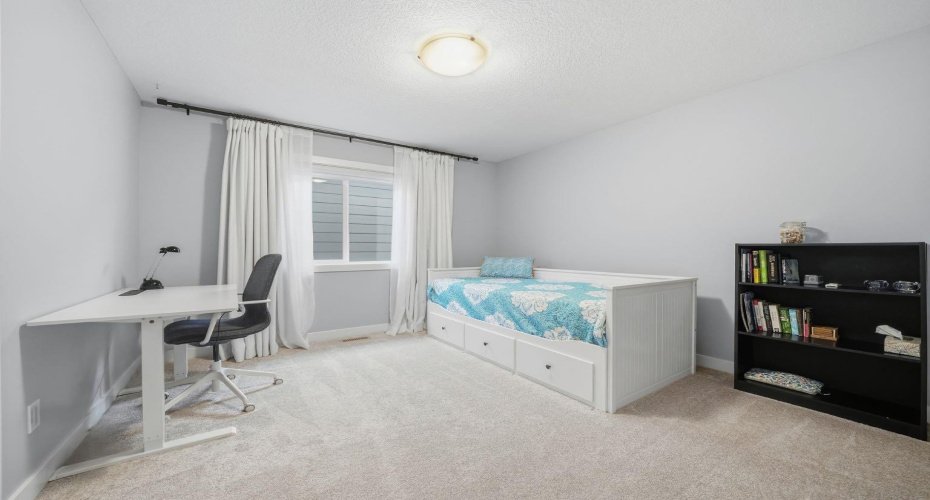 902 Bluerock Way, Calgary, Alberta T2Y 0S5, 3 Bedrooms Bedrooms, ,3 BathroomsBathrooms,Residential,For Sale,Bluerock,A2304430