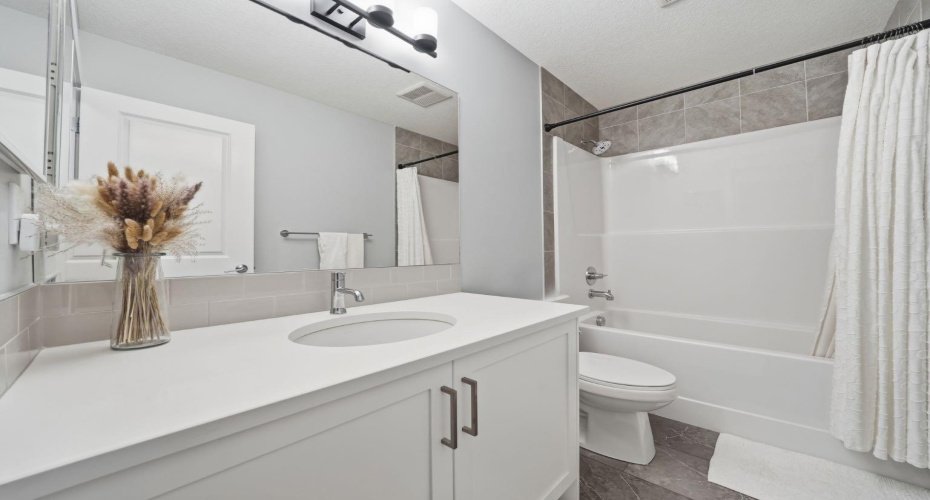 902 Bluerock Way, Calgary, Alberta T2Y 0S5, 3 Bedrooms Bedrooms, ,3 BathroomsBathrooms,Residential,For Sale,Bluerock,A2304430