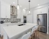 902 Bluerock Way, Calgary, Alberta T2Y 0S5, 3 Bedrooms Bedrooms, ,3 BathroomsBathrooms,Residential,For Sale,Bluerock,A2304430