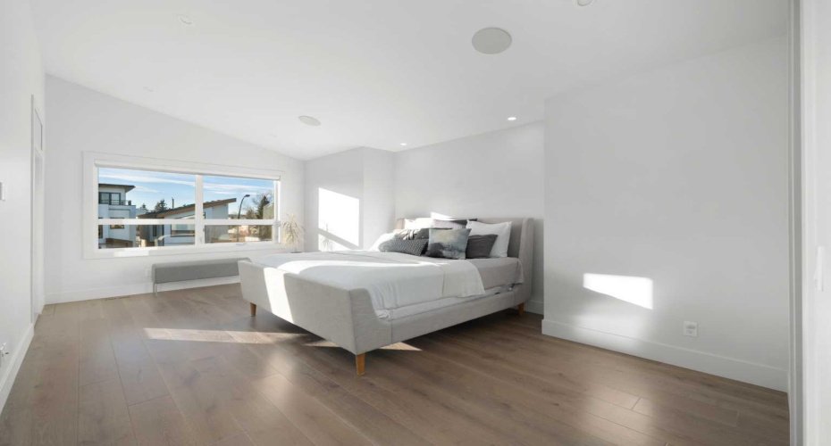 Large Primary Retreat with Private Balcony & Tons of Light