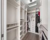 Primary Walk-in Closet with Custom Built-ins