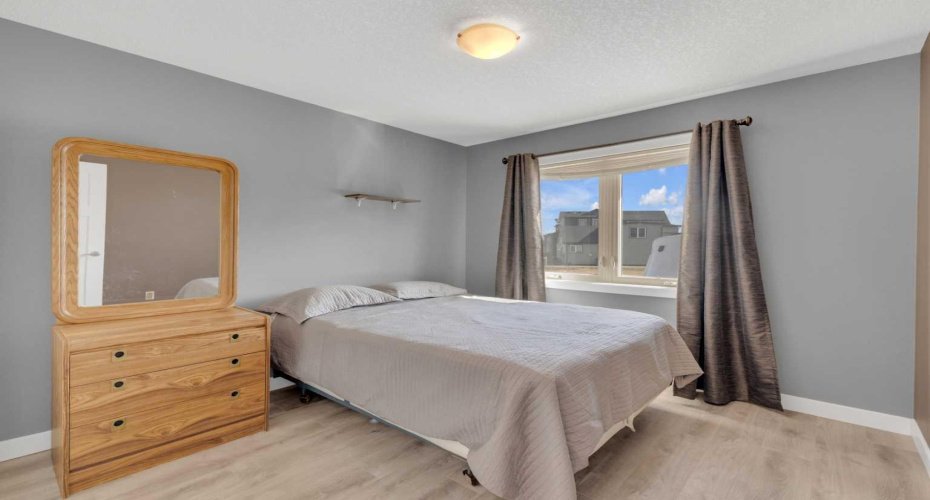 Second bedroom at the front of the home on the main floor.