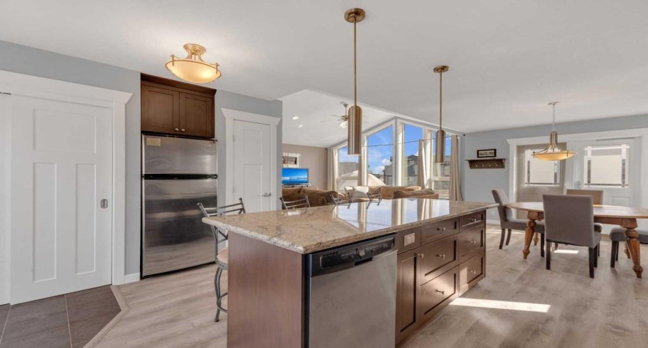 Smooth flow from the kitchen through to the dining and living room spaces.