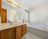 Ensuite bathroom with walk in closet