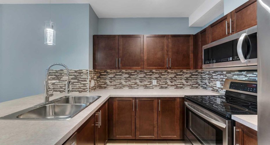 604 East Lake Boulevard, Airdrie, Alberta T4A 0G6, 2 Bedrooms Bedrooms, ,2 BathroomsBathrooms,Residential,For Sale,East Lake,A2304127