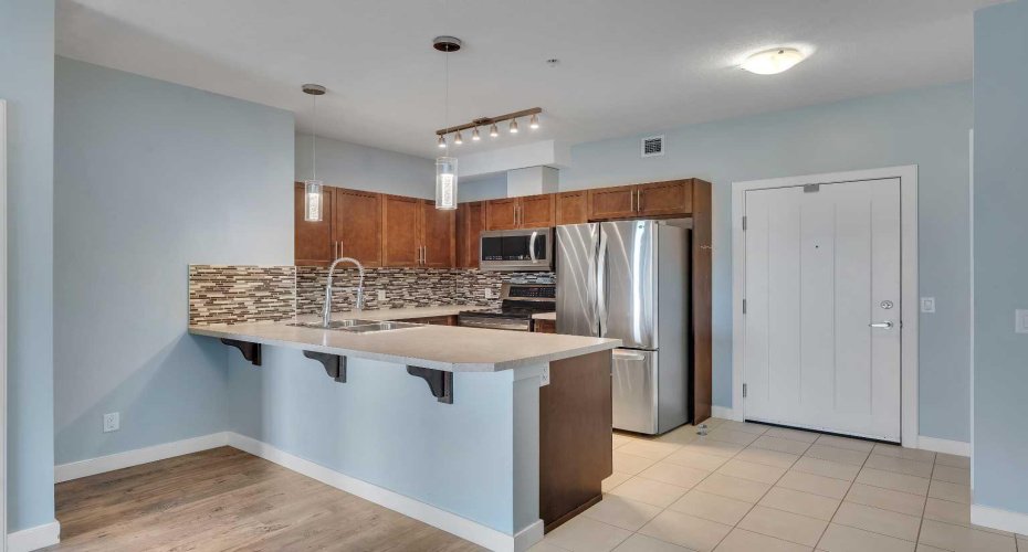 604 East Lake Boulevard, Airdrie, Alberta T4A 0G6, 2 Bedrooms Bedrooms, ,2 BathroomsBathrooms,Residential,For Sale,East Lake,A2304127