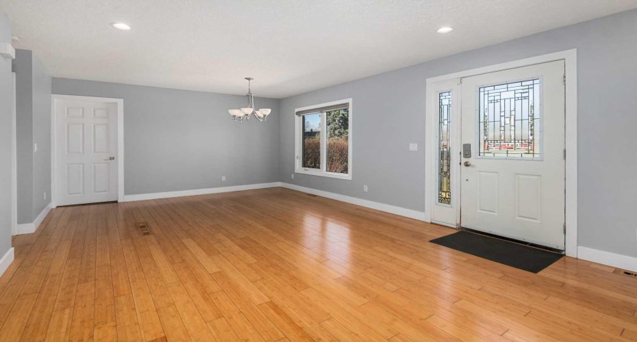Large, open living room and dining room.