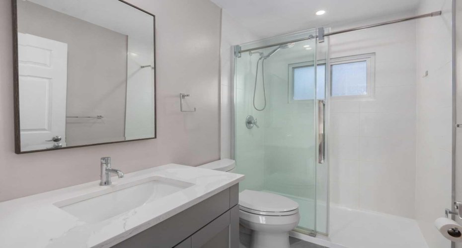 Fully-renovated main floor bath with in-floor heating.