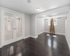 Lower level bedroom featuring laminate flooring