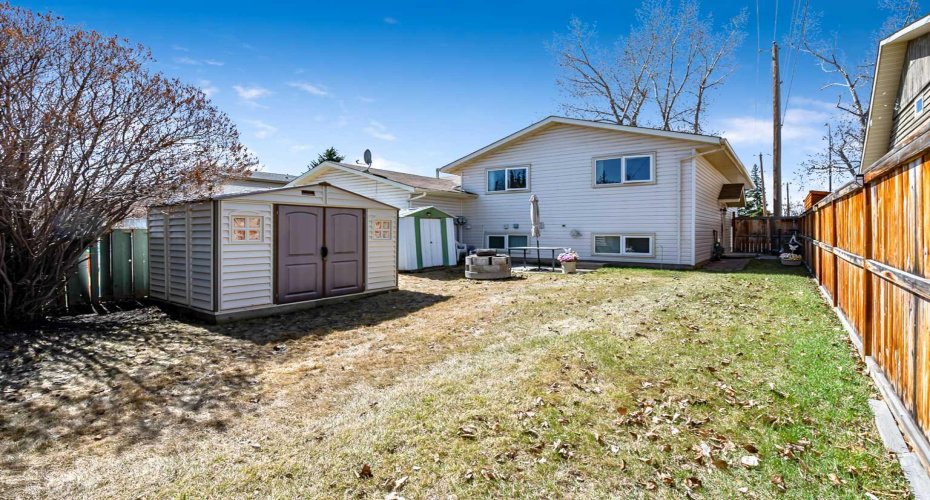323 Woodvale Crescent, Calgary, Alberta T2W 3L3, 4 Bedrooms Bedrooms, ,2 BathroomsBathrooms,Residential,For Sale,Woodvale,A2304263