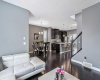 Open concept main floor with 9' ceilings, hardwood flooring and central AC.