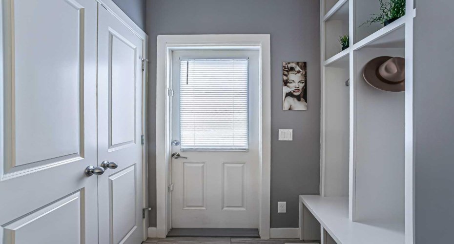 The back entry feautures a locker style storage and coat closet.