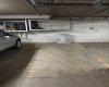 Parking stall 318 with storage cage is conveniently located very close to the condo.