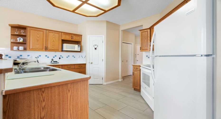 Kitchen to front entrance.