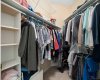 Primary bedroom, walk-in closet with organizers.