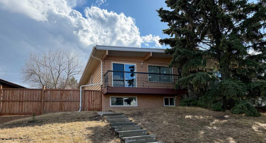 11723 Canfield Road, Calgary, Alberta T2W 1J6, 4 Bedrooms Bedrooms, ,2 BathroomsBathrooms,Residential,For Sale,Canfield,A2303589