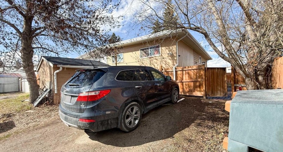 11723 Canfield Road, Calgary, Alberta T2W 1J6, 4 Bedrooms Bedrooms, ,2 BathroomsBathrooms,Residential,For Sale,Canfield,A2303589