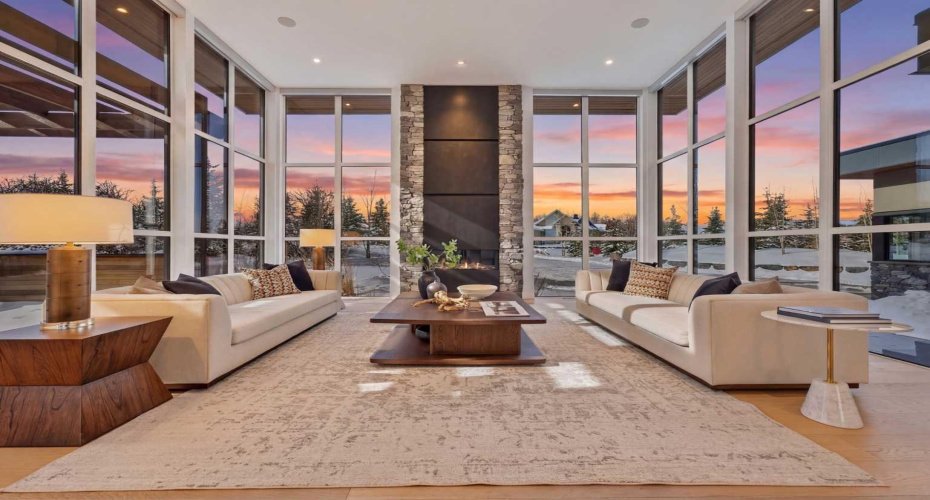 Stunning great room with S/SW light exposures & automated Hunter Douglas window coverings.