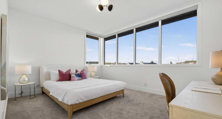 Upper level bedroom #1 with ensuite and walk-in closet.
