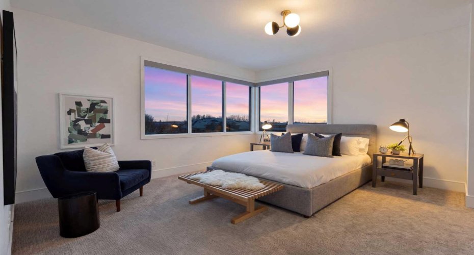 Upper level bedroom #2 with ensuite and walk-in closet.