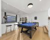 Recreation/games area adjacent to the theatre and home gym.