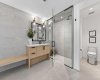 Additional lower level bathroom, great for post workout showers or guests.
