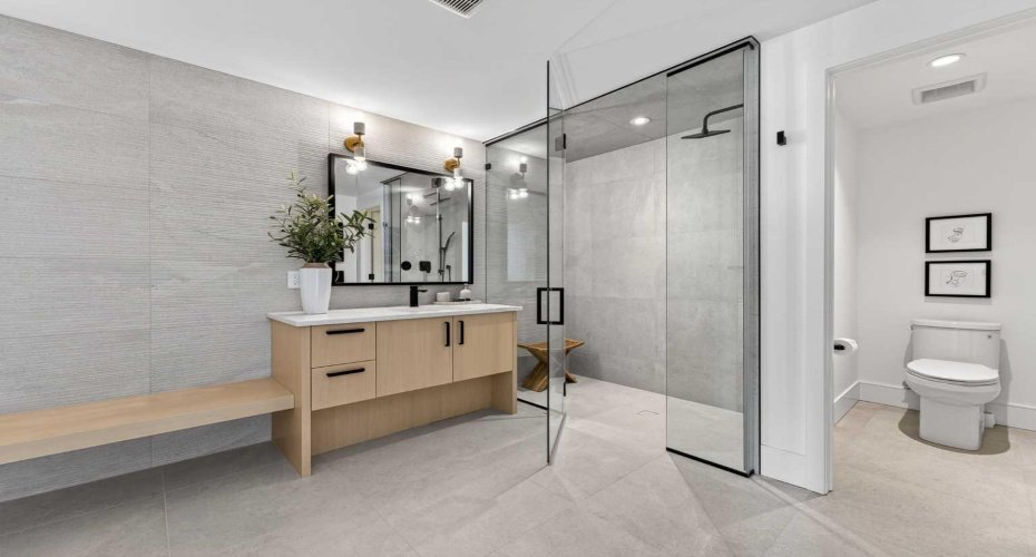Additional lower level bathroom, great for post workout showers or guests.
