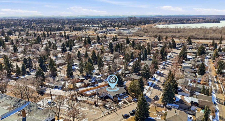 Rare corner lot with side and back alley access—perfect for flexibility and future potential—with quick and easy access to the mountains.