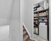 Leading upstairs to the second level, there is ample storage