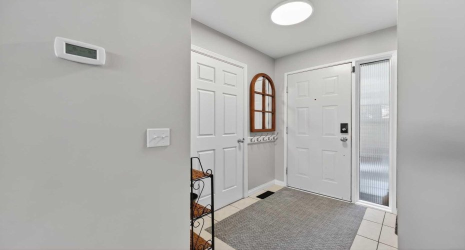 The front entrance. The washer and dryer is located in that closet.