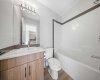 Second bathroom featuring clean finishes and a functional layout.