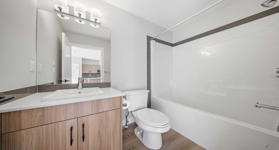 Second bathroom featuring clean finishes and a functional layout.