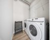 In-suite laundry area offering everyday convenience.