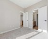 Primary bedroom shown without virtual staging.