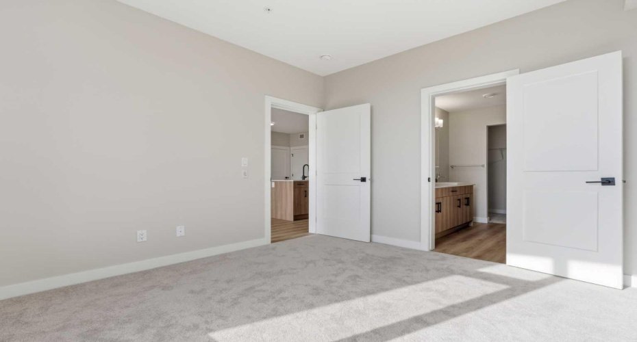 Primary bedroom shown without virtual staging.